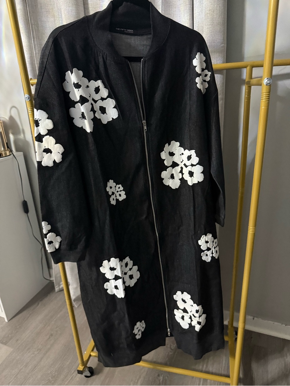 The Fifth Label Black Zip-Front Trench Coat with White Floral Appliqués